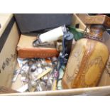 Two boxes containing a petty cash box, an abacus, Oriental prints, a soda siphon, cutlery sets,