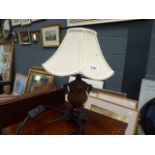 Glass and cast iron table lamp with cream fabric shade