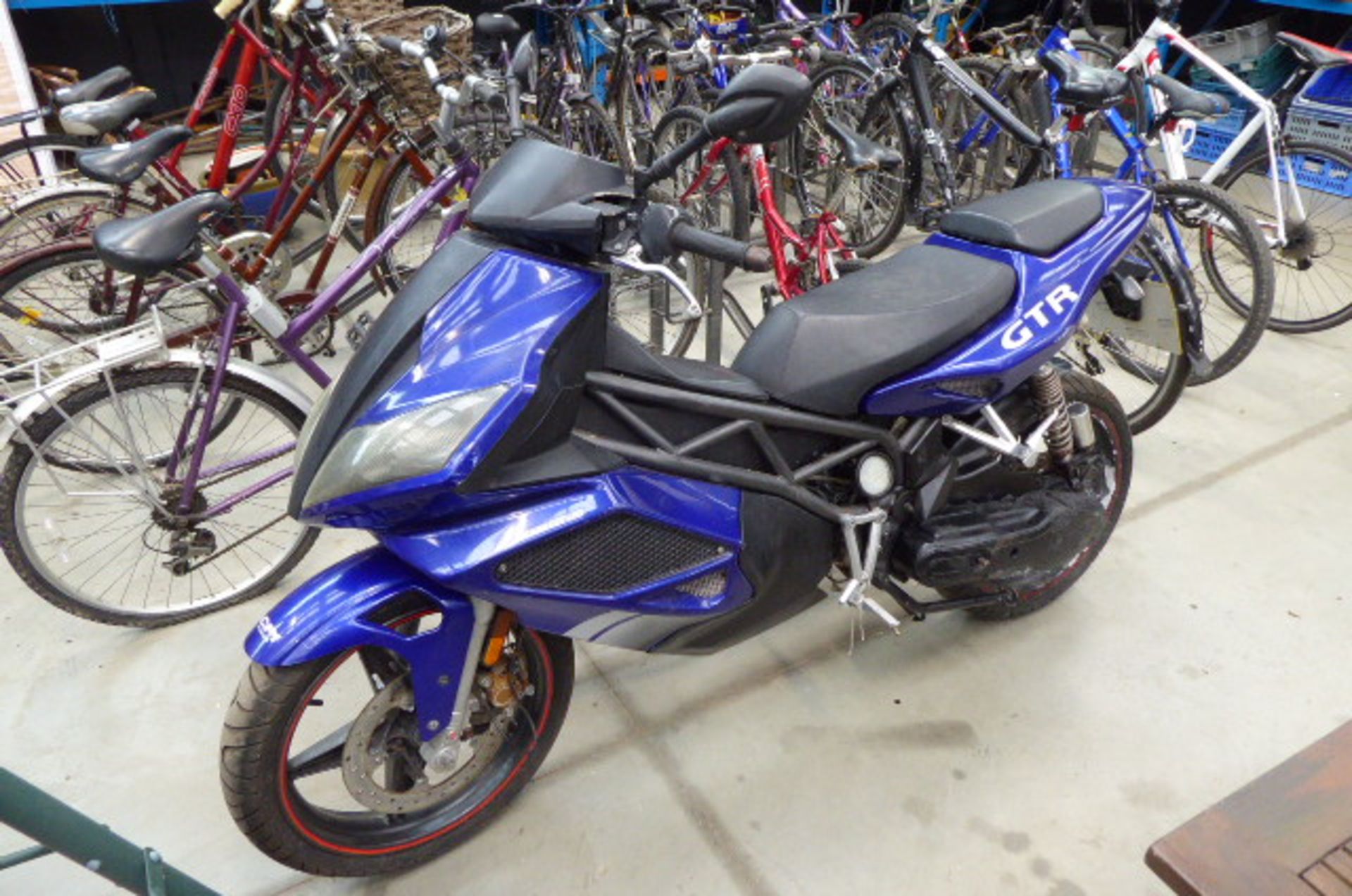 Blue Honda GTR 125 motorcycle