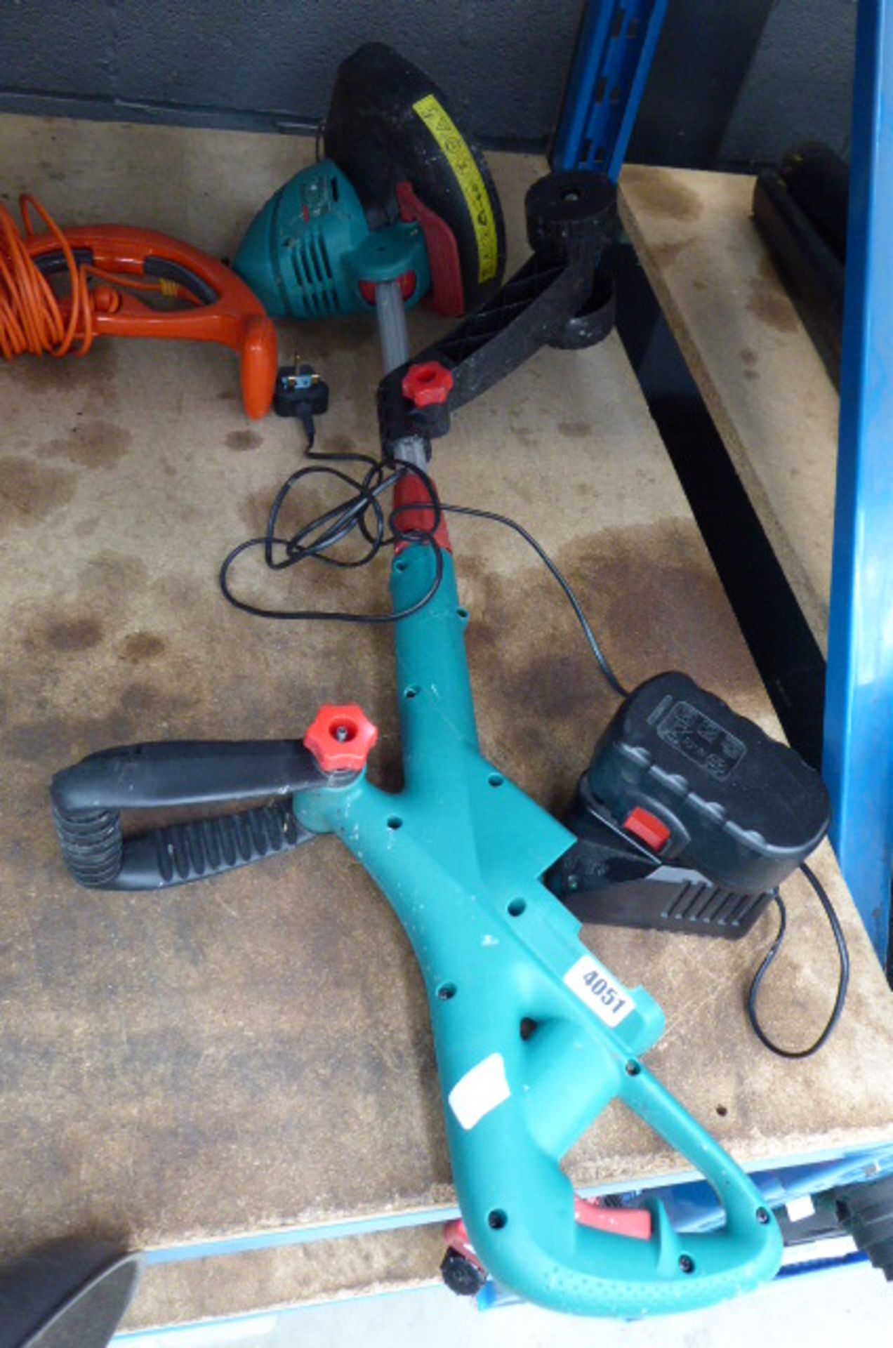 Bosch battery powered strimmer and a Flymo strimmer - Image 2 of 3