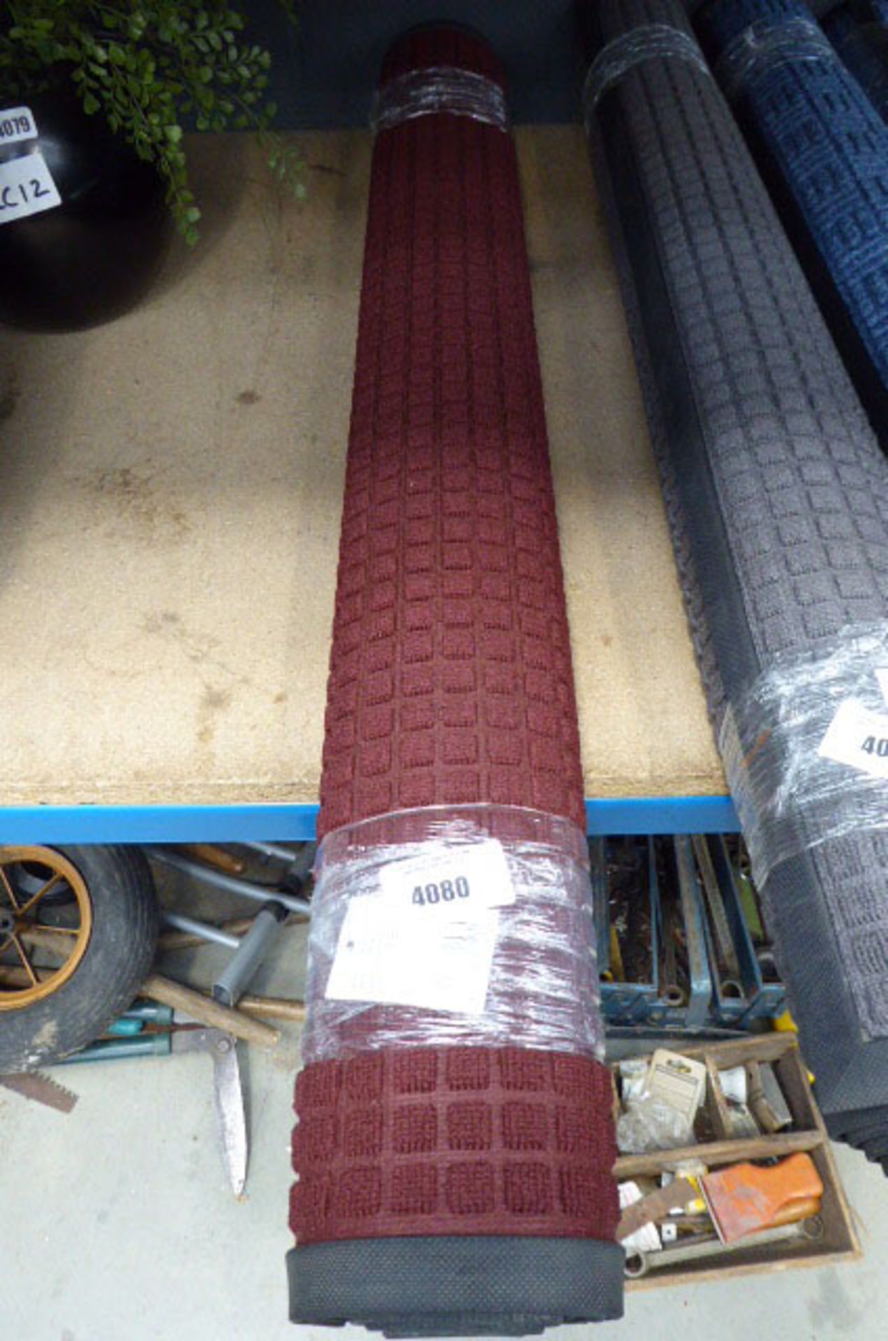 Light brown rubber backed mat