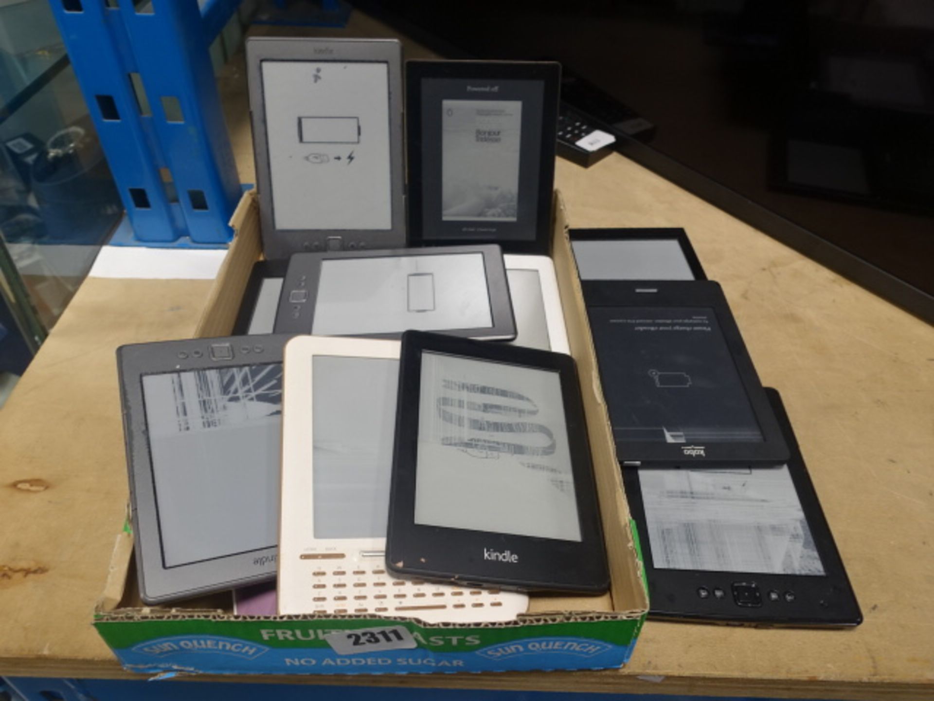 Box containing various Sony and other Amazon e-Book readers