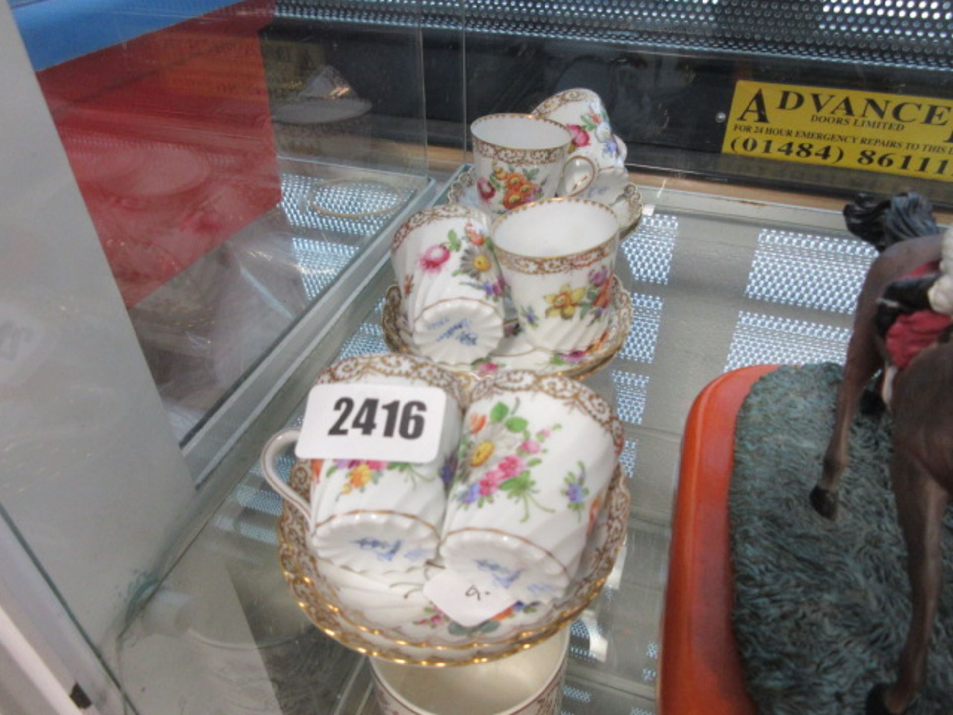 Dresden miniature tea set and saucers