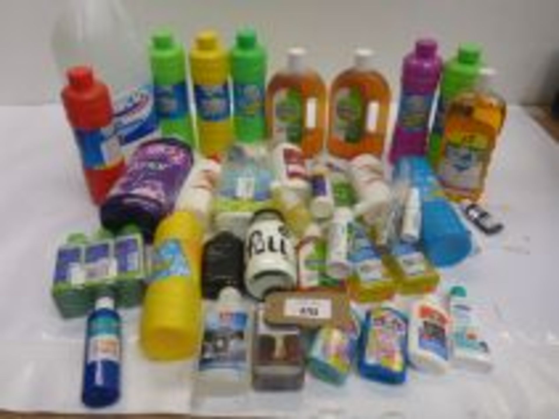 Bag containing household products including Disinfectant, fabric conditioner, PVA glue, bubble