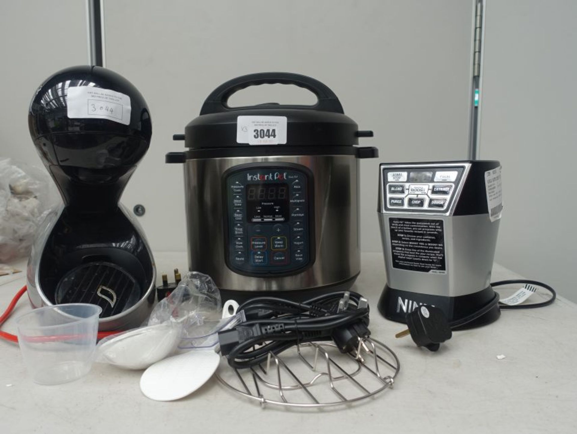 Instant pot pressure cooker with power supply and accessories plus Nescafe Dolce Gusto coffee