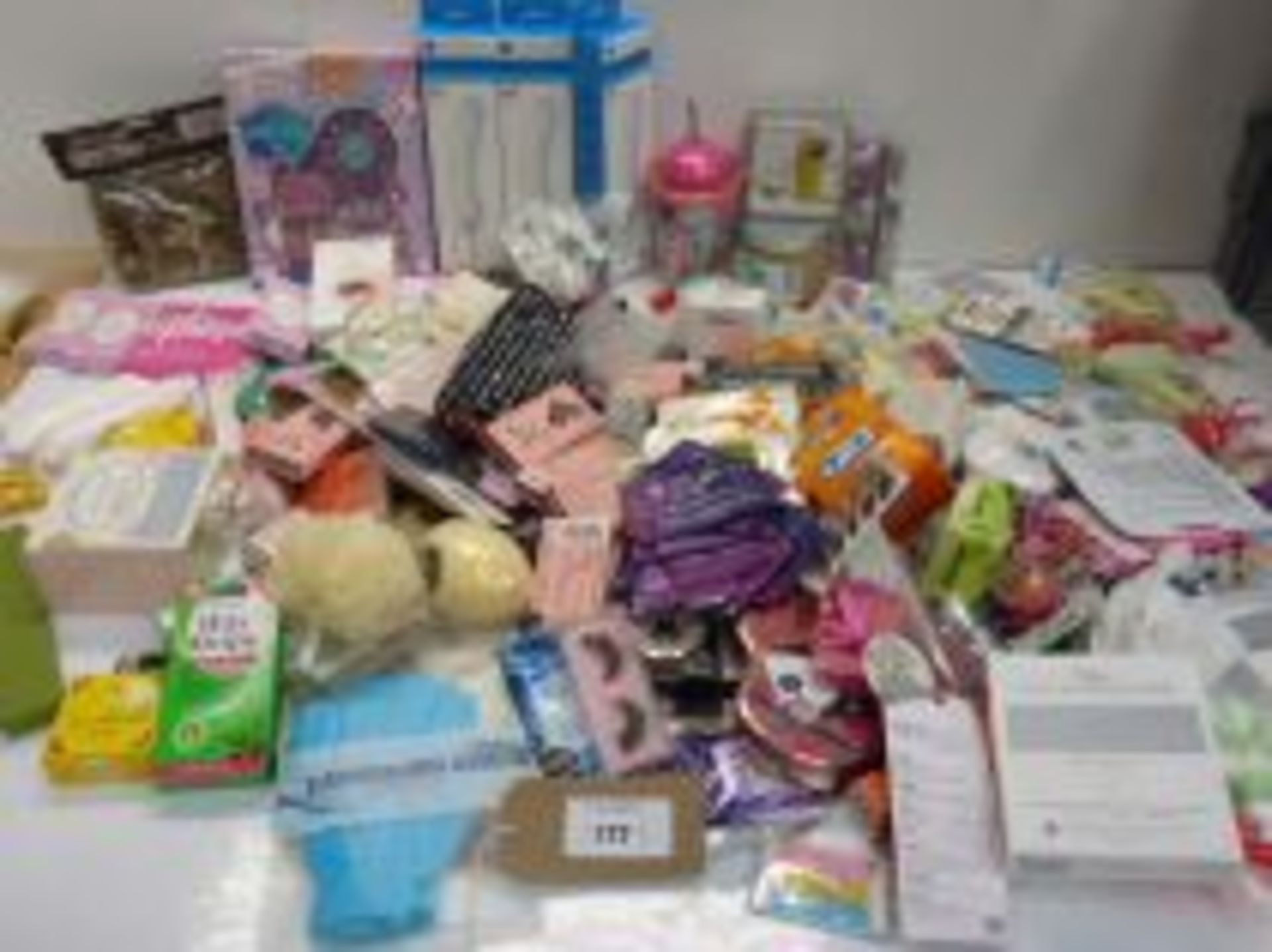 Large bag of beauty products including bath bombs, soaps, wax strips, teeth whitening strips,