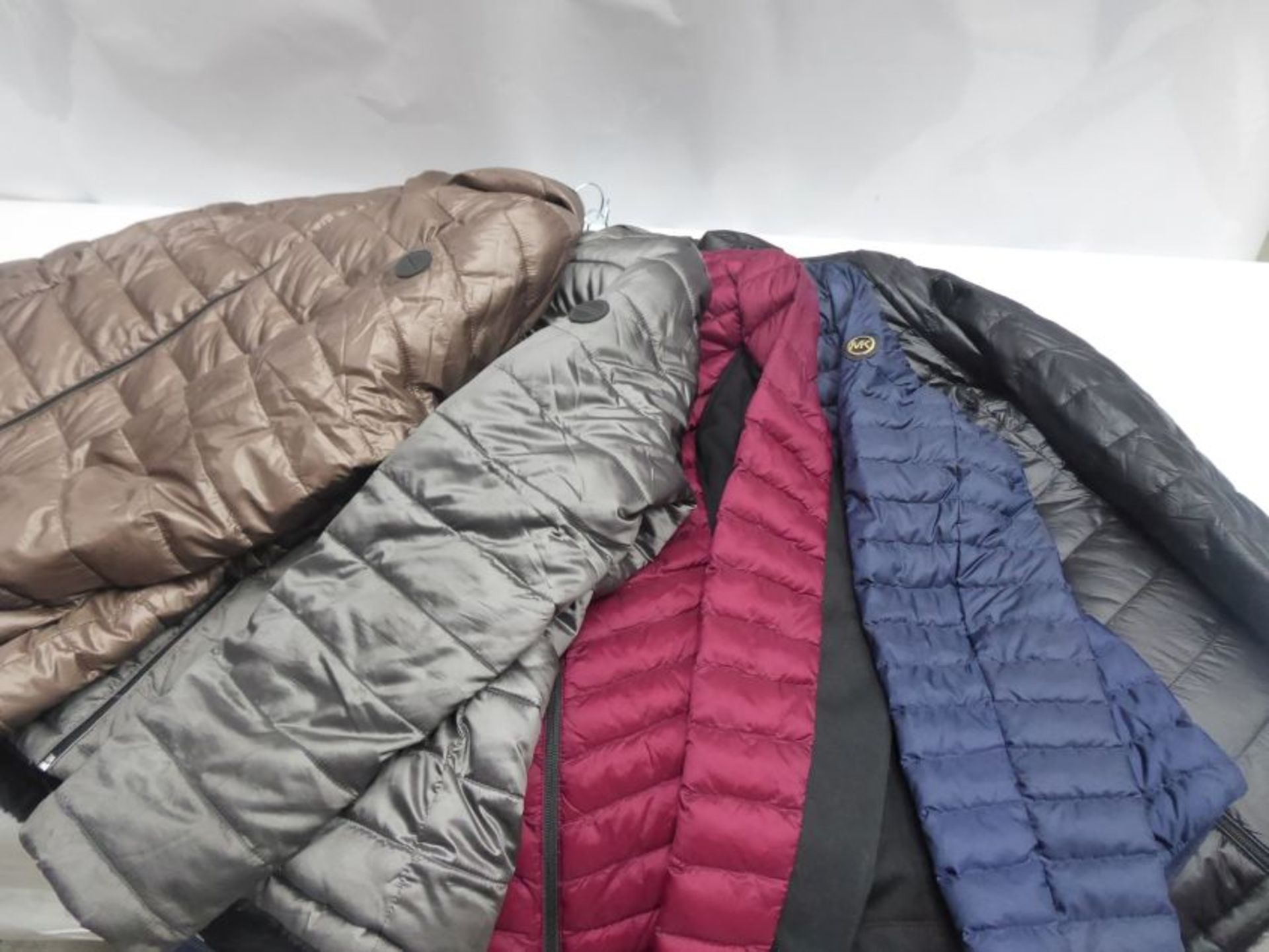 Collection of five quilted jackets by Andrew Marc and Michael Kors, in gold, silver, red, blue and - Image 2 of 2