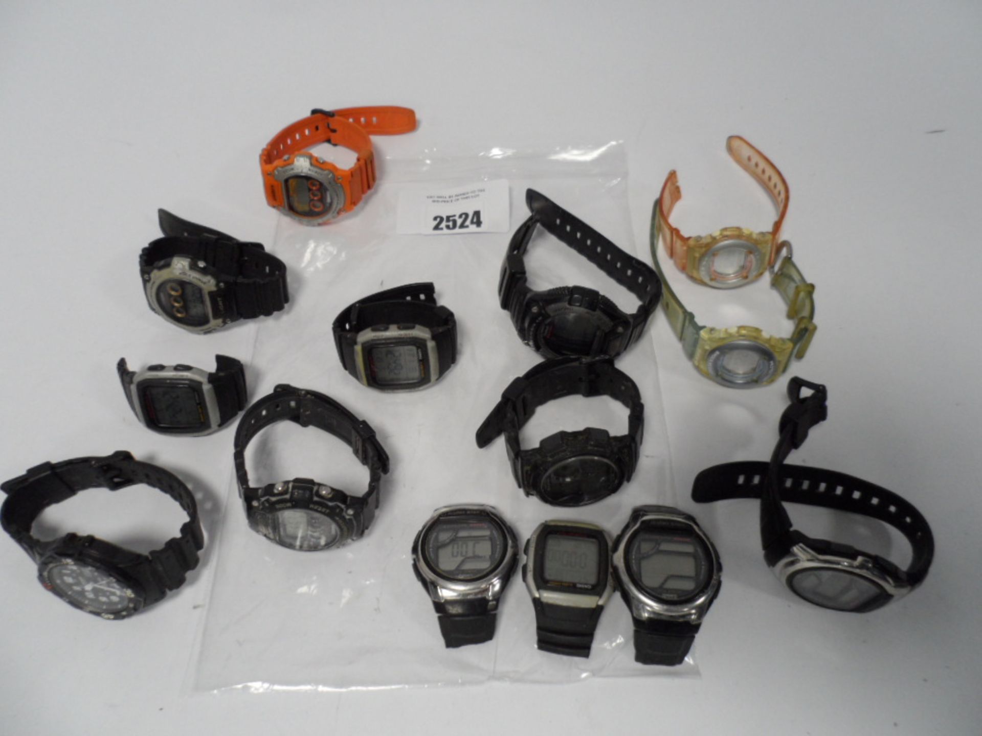 Bag containing various Casio digital watches, Wave Ceptor, Baby-G, etc.