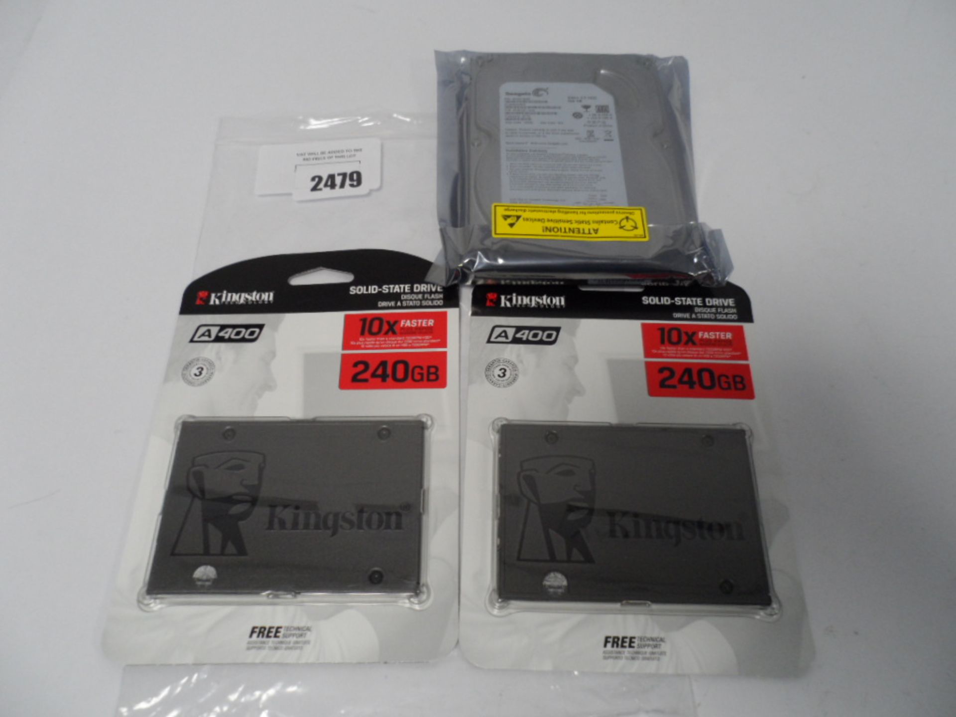 Two Kingston A400 240GB SSD in sealed packaging with a Seagate 500GB 3.5'' harddrive in sealed