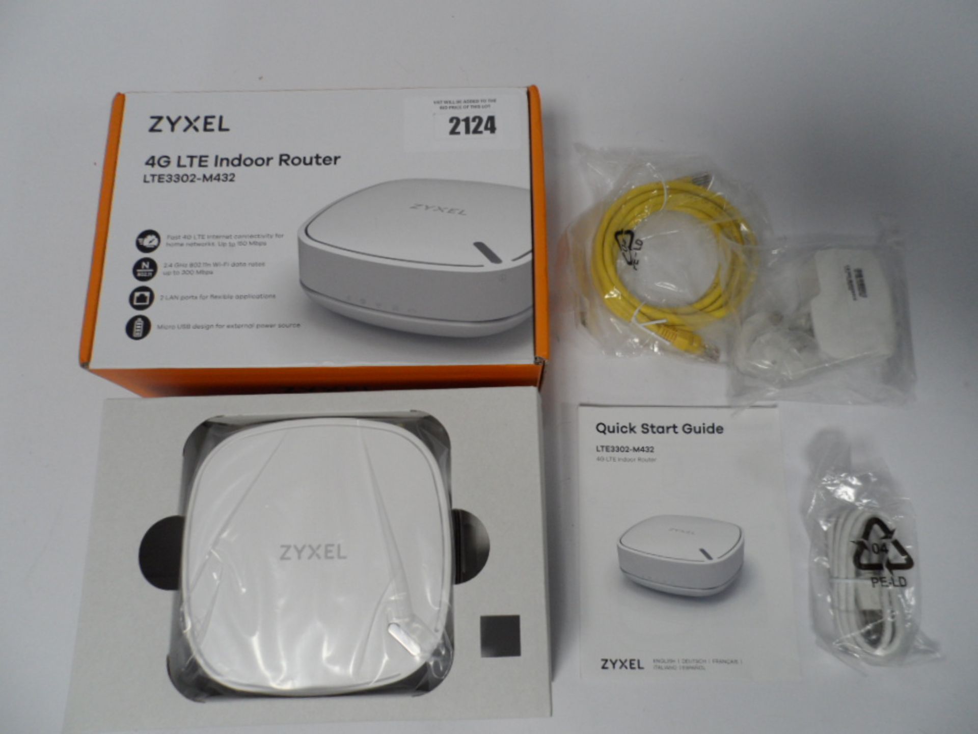 Zyxel 4G LTE indoor router Model LTE3302-M432 Boxed with network cable and power supply.