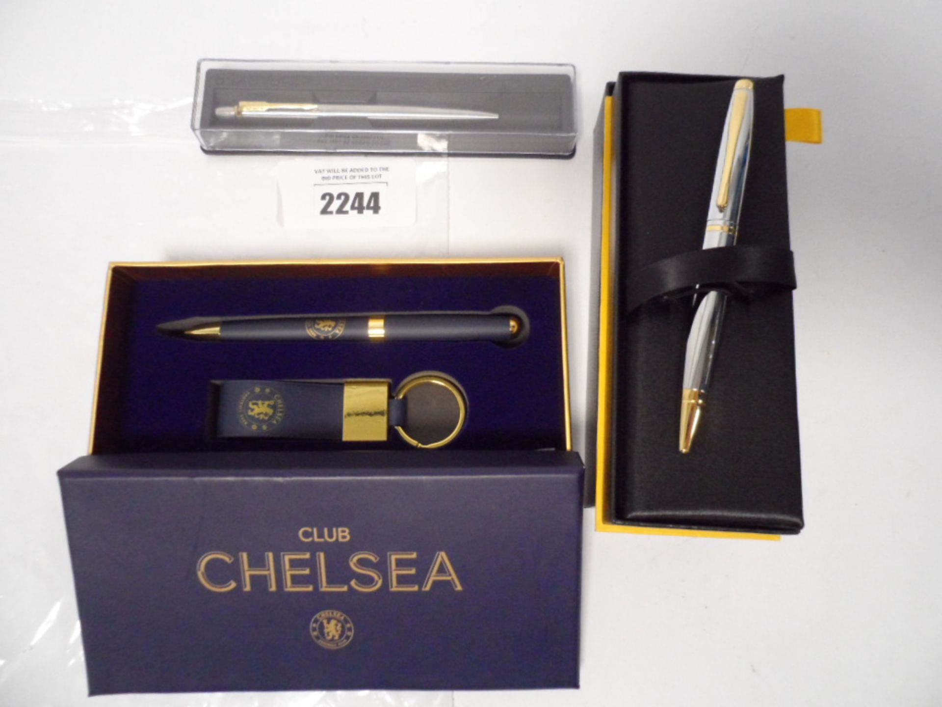 Cross , Parker ballpoint pens together with a Chelsea FC pen gift set.