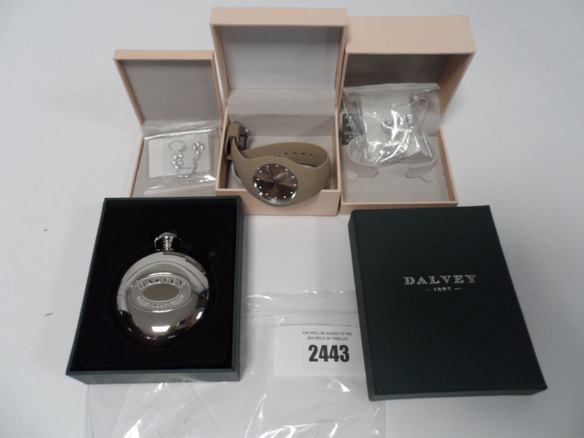 Three boxed Diamonique Items, watch, earrings, bracelet, with a Dalvey circular hip flask.