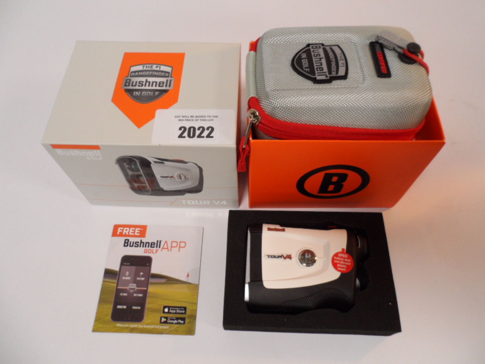 Bushnell Tour V4 golf rangefinder. Includes battery, Bushnell case, and box.