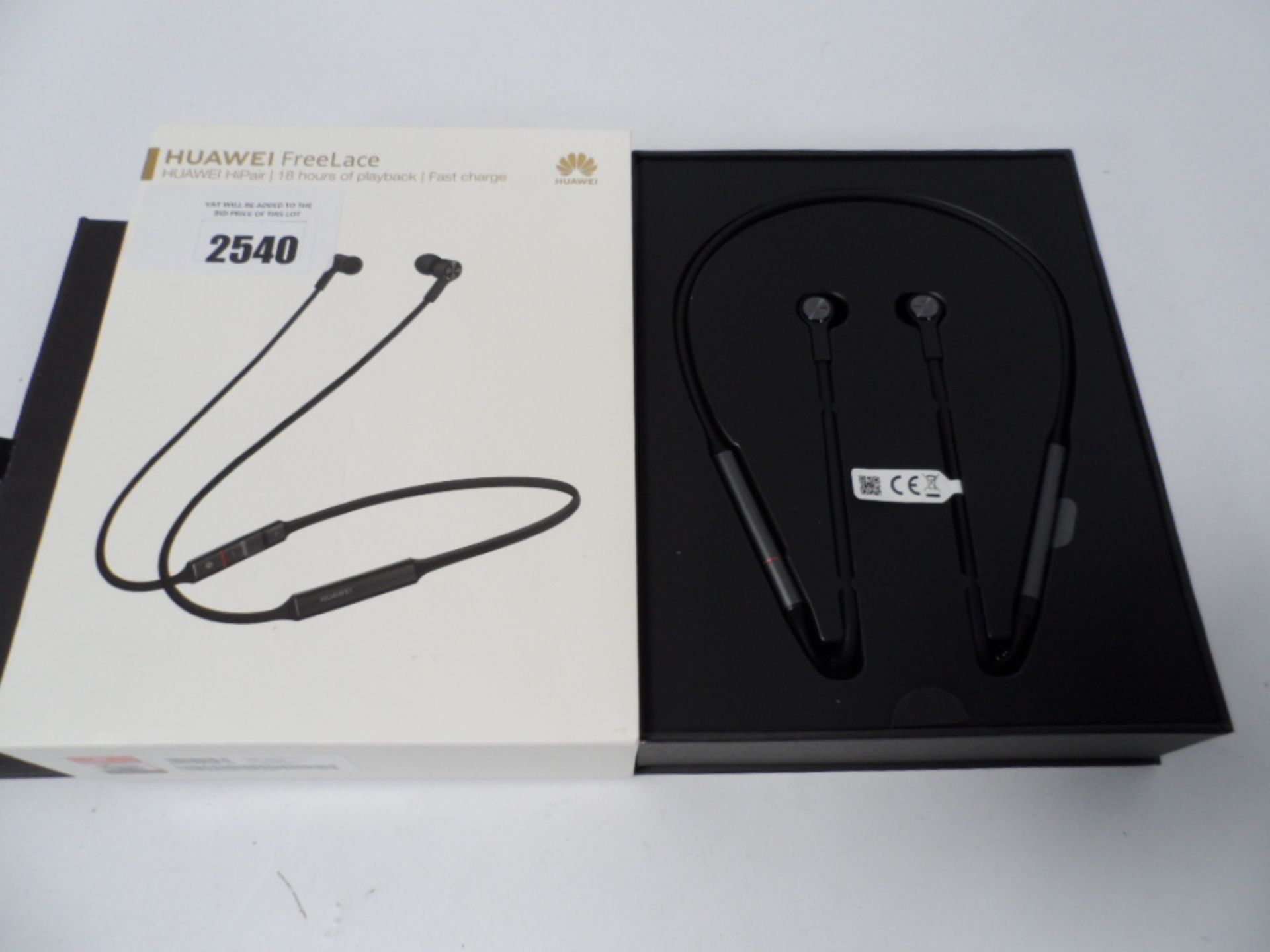 Huawei Freelace earphones, boxed.