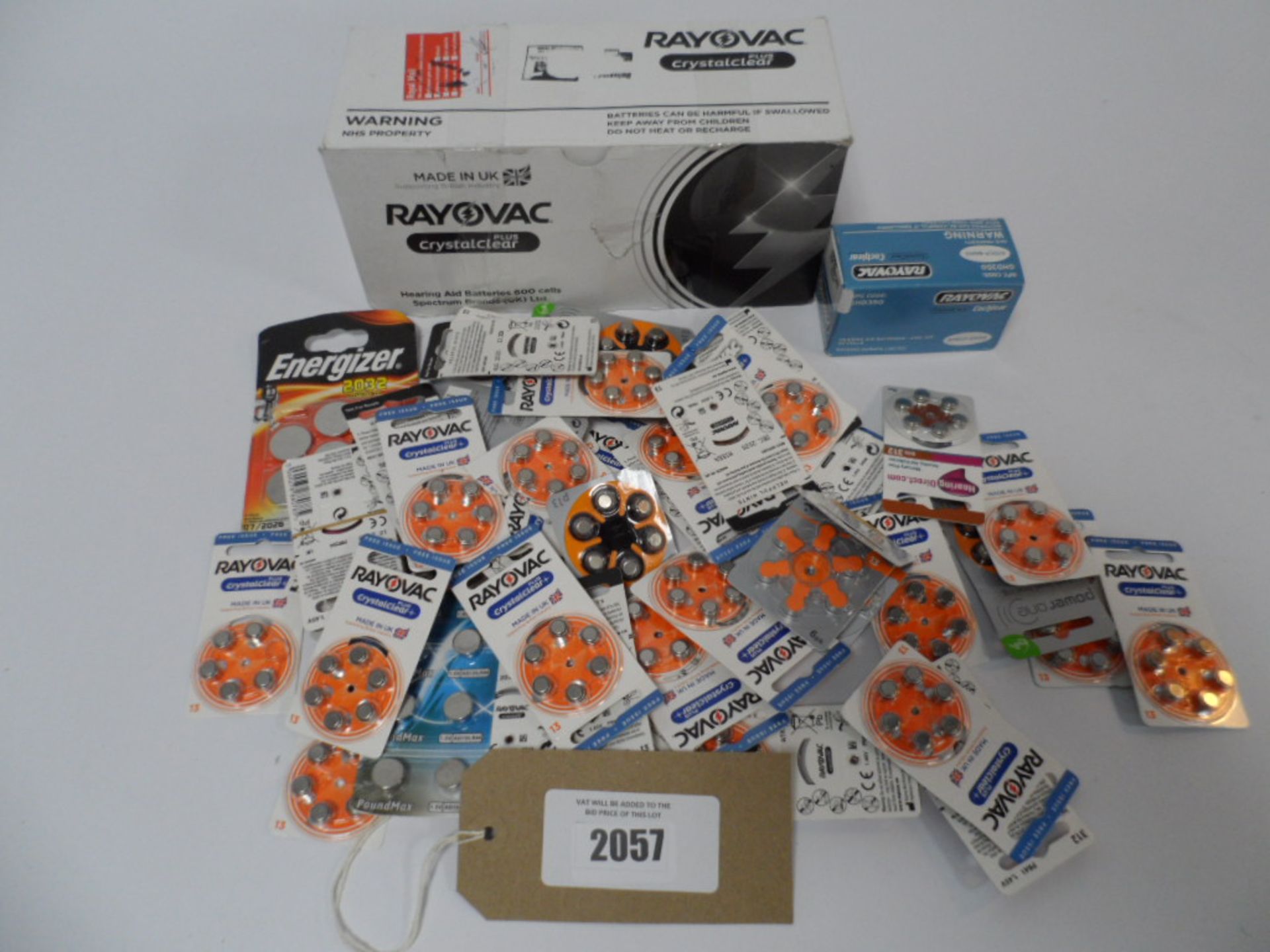 Bag of Hearing aid batteries including a Rayovac box of 600 cell of crystalclear plus batteries.