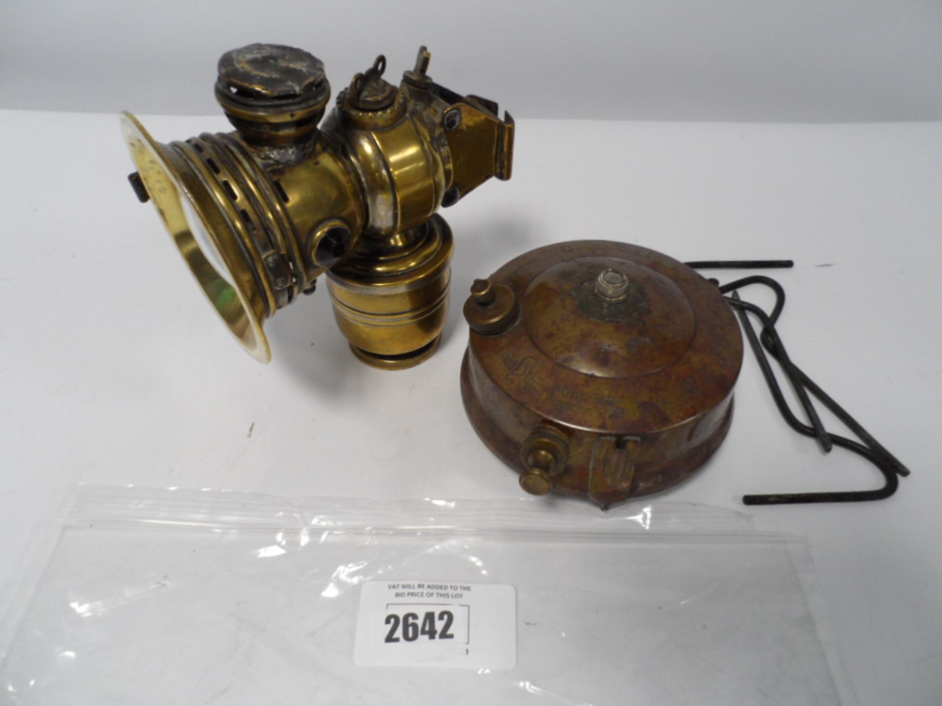 Hipo-lito vintage gas burner and a brass vintage lamp.