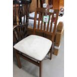 Folding chair with suede seat