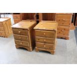Pair of pine 3 drawer bedside cabinets
