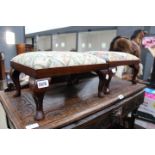 Pair of footstools with embroided seats and cabriol supports