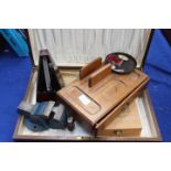 A cutlery box plus a vice, a desk tidy, Metronome and 2 boxes containing a qty of coinage