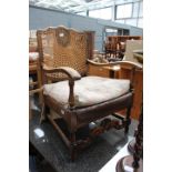 Wicker backed oak armchair