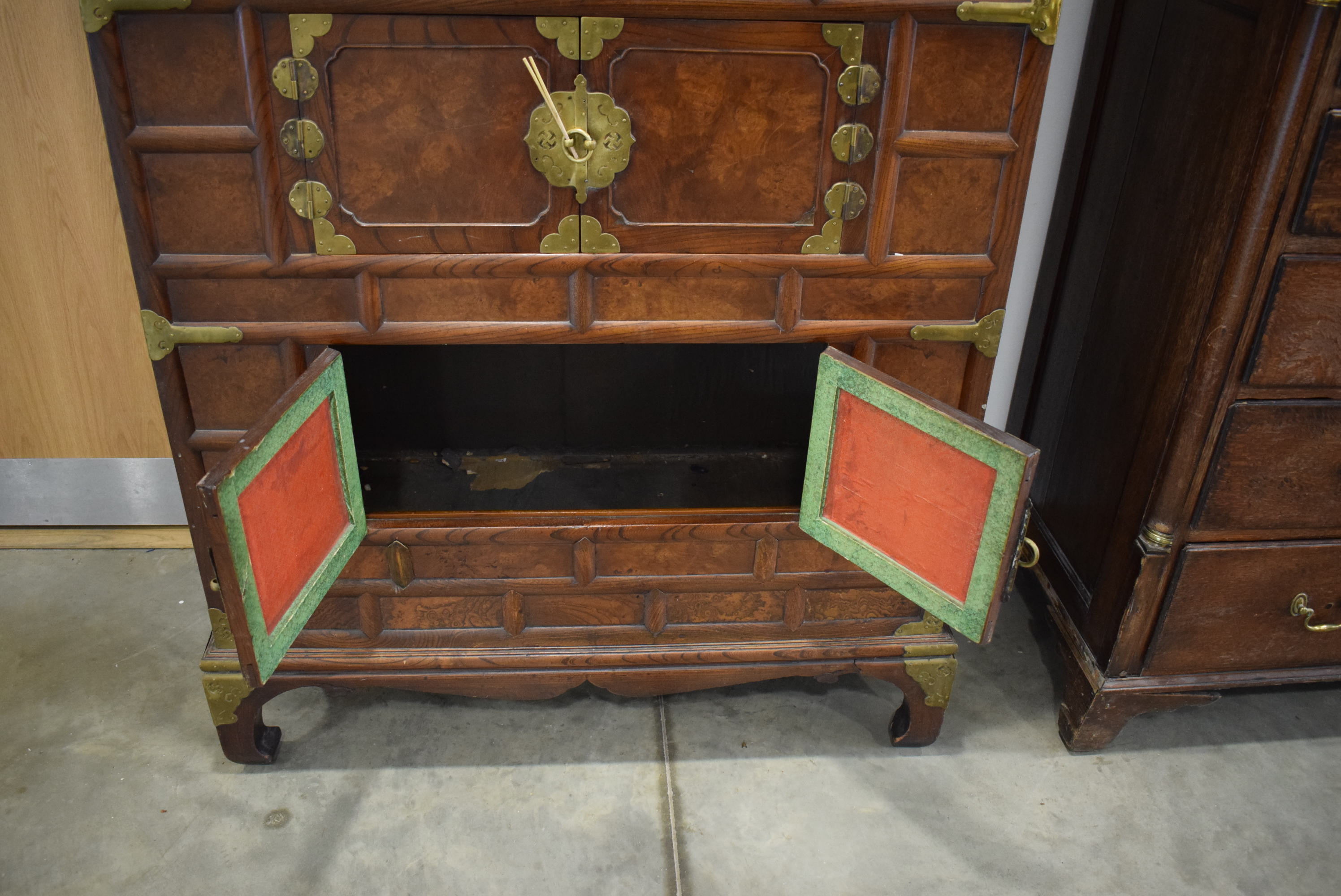 25RR A Korean elm and brass mounted cabinet having four small drawers above three pairs of doors - Image 4 of 6