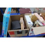 4 boxes containing children's toys, board games, and toy cars