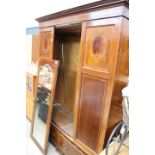 Edwardian wardrobe with central mirrored door and 2 drawers under