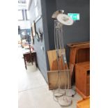 Pair of chromed mother and child floor lamps