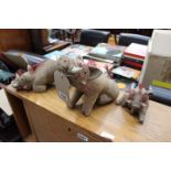 3 clay figures of Warthogs