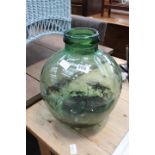 Small green glass carboy