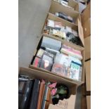5 boxes containing a large qty of video cassettes, tape cassettes, CD's and DVD's