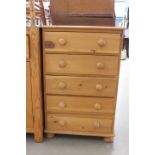 Narrow pine chest of 5 drawers