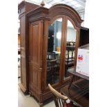 Dome topped wardrobe with double mirrored doors