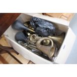 Box containing brassware to include car horns and oil lamps