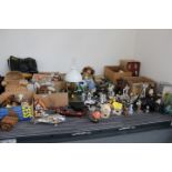 Large quantity of scent bottles, childrens bisque dolls, carnival glass, ornamental animals to