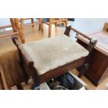 Piano stool with upholstered hinged seat