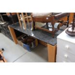 Beech dining table with granite surface