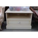 Cream painted television stand with shelf and drawer under