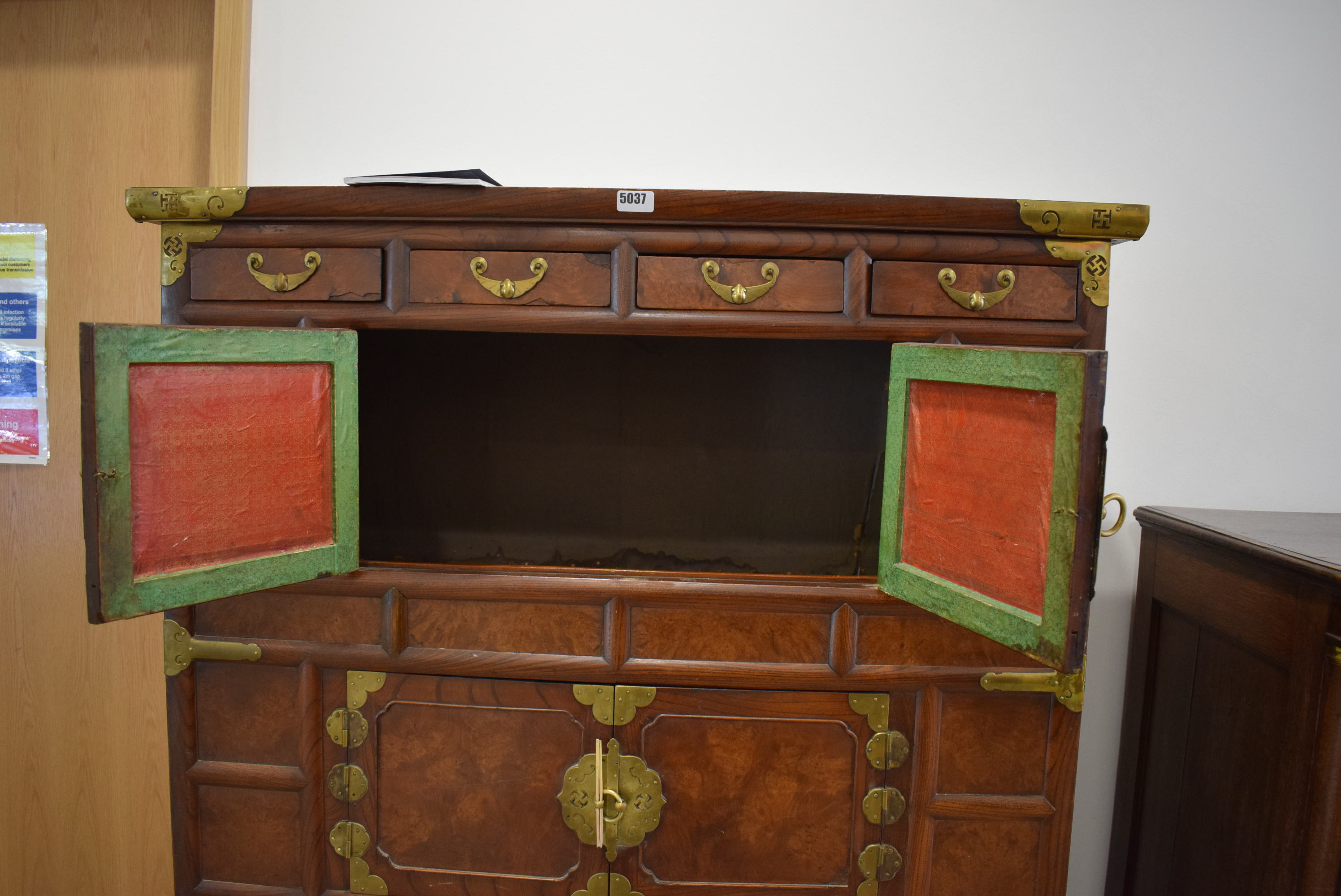 25RR A Korean elm and brass mounted cabinet having four small drawers above three pairs of doors - Image 2 of 6