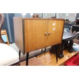 1950's double door record cabinet on raised supports
