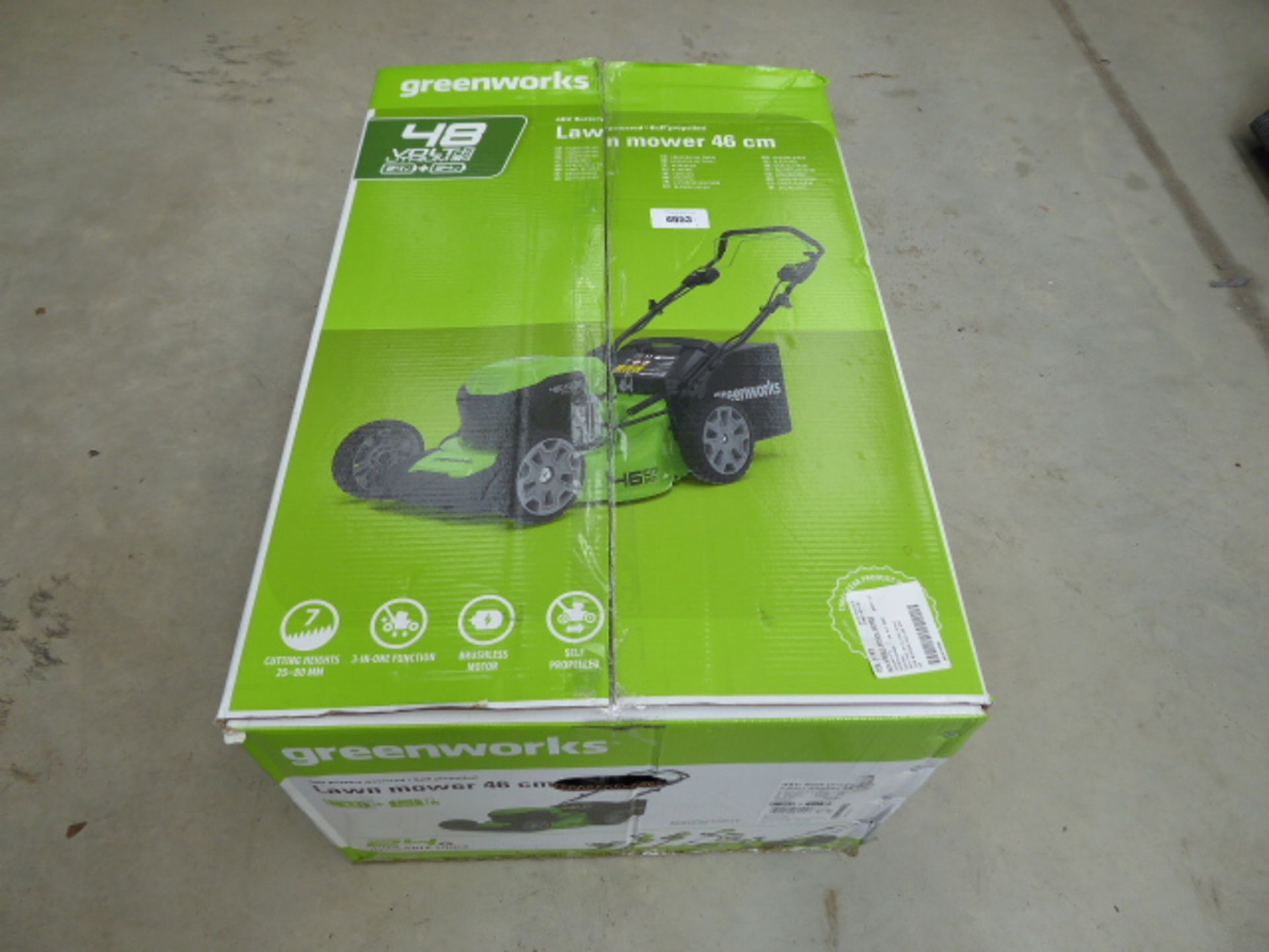 Greenworks 48volt lawnmower in green with grassbox