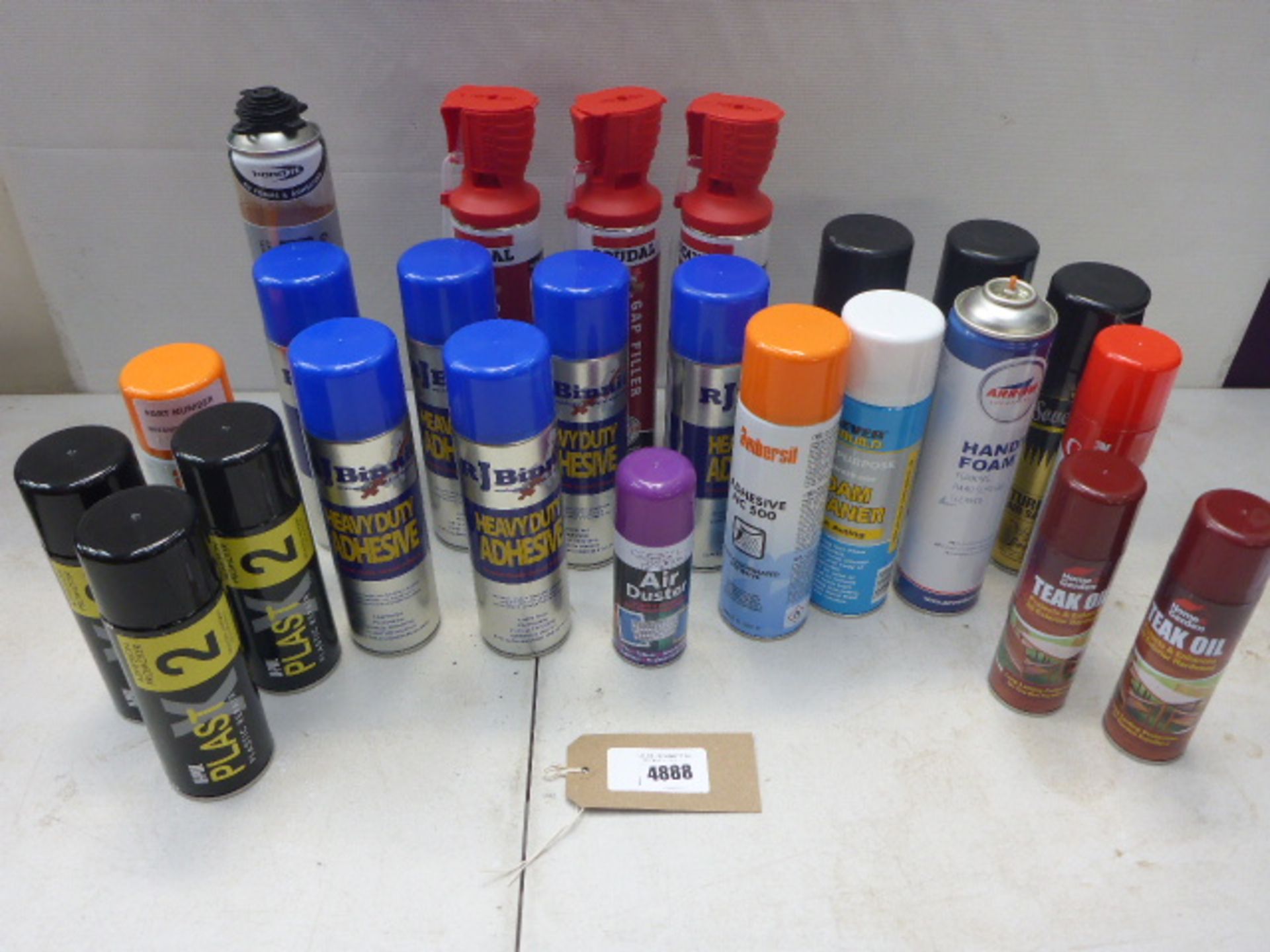 Bag containing heavy duty adhesive, gap filler, hand foam, tea coil, plastic repair spray, and