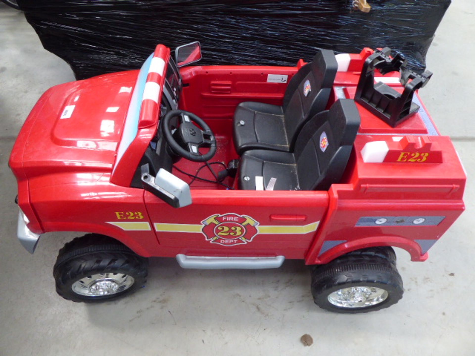 Child's ride on fire engine with charging cable