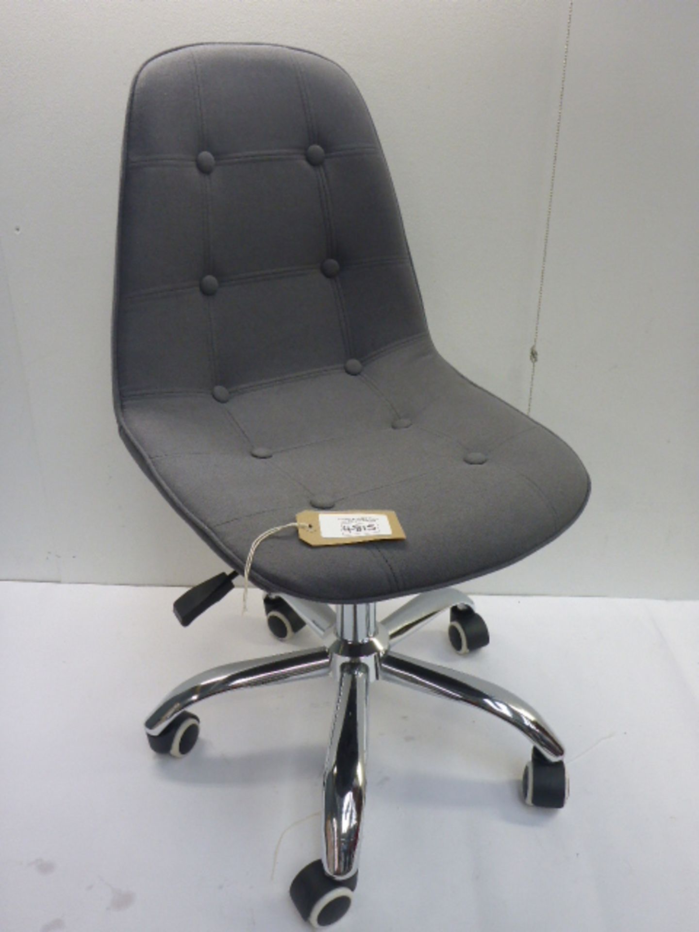 Grey chrome based swivel chair