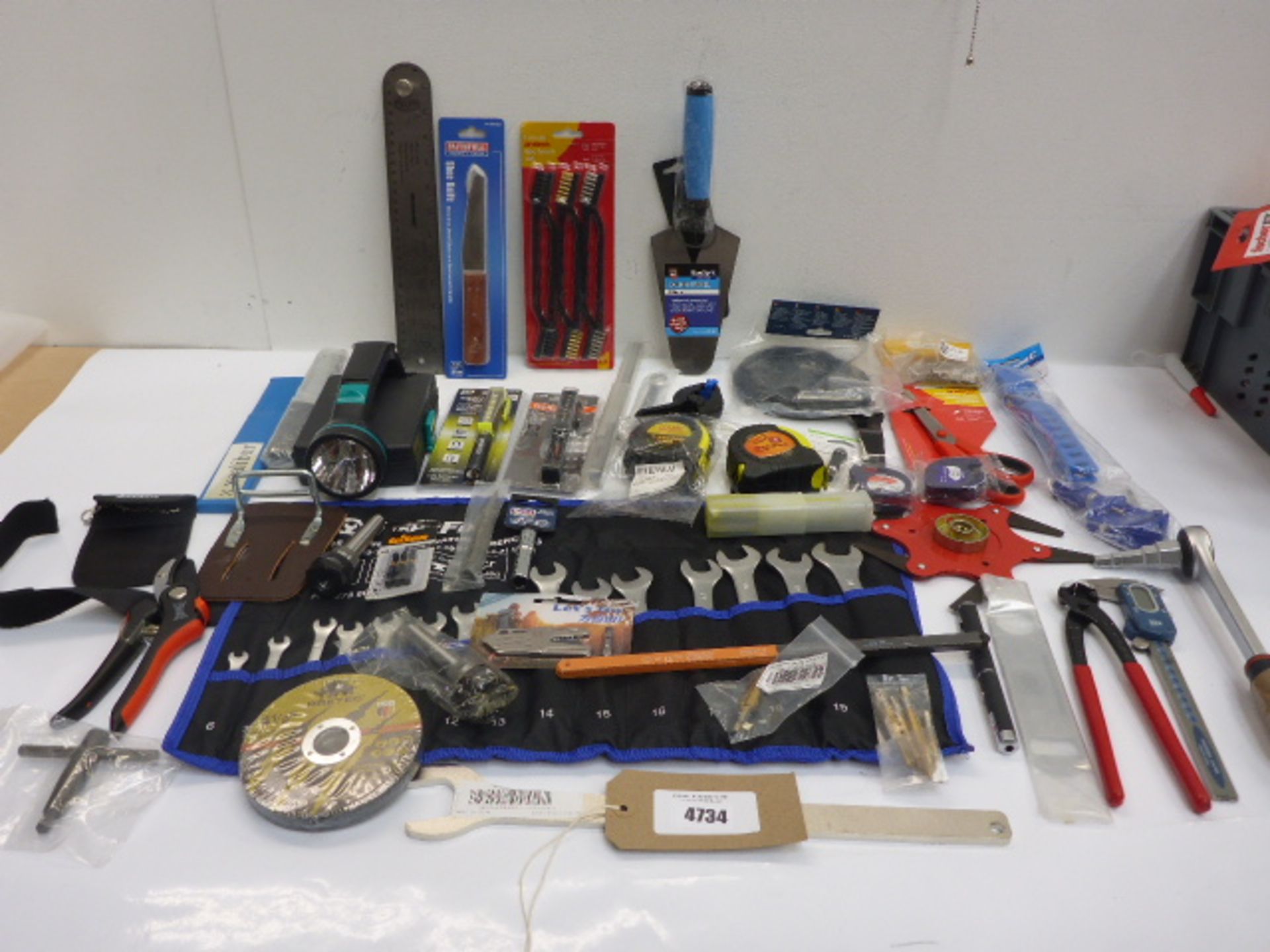 Blue Spot trowel, Silverline sharp angle, torches, tape measures, spanners & pouch, hammer loop,