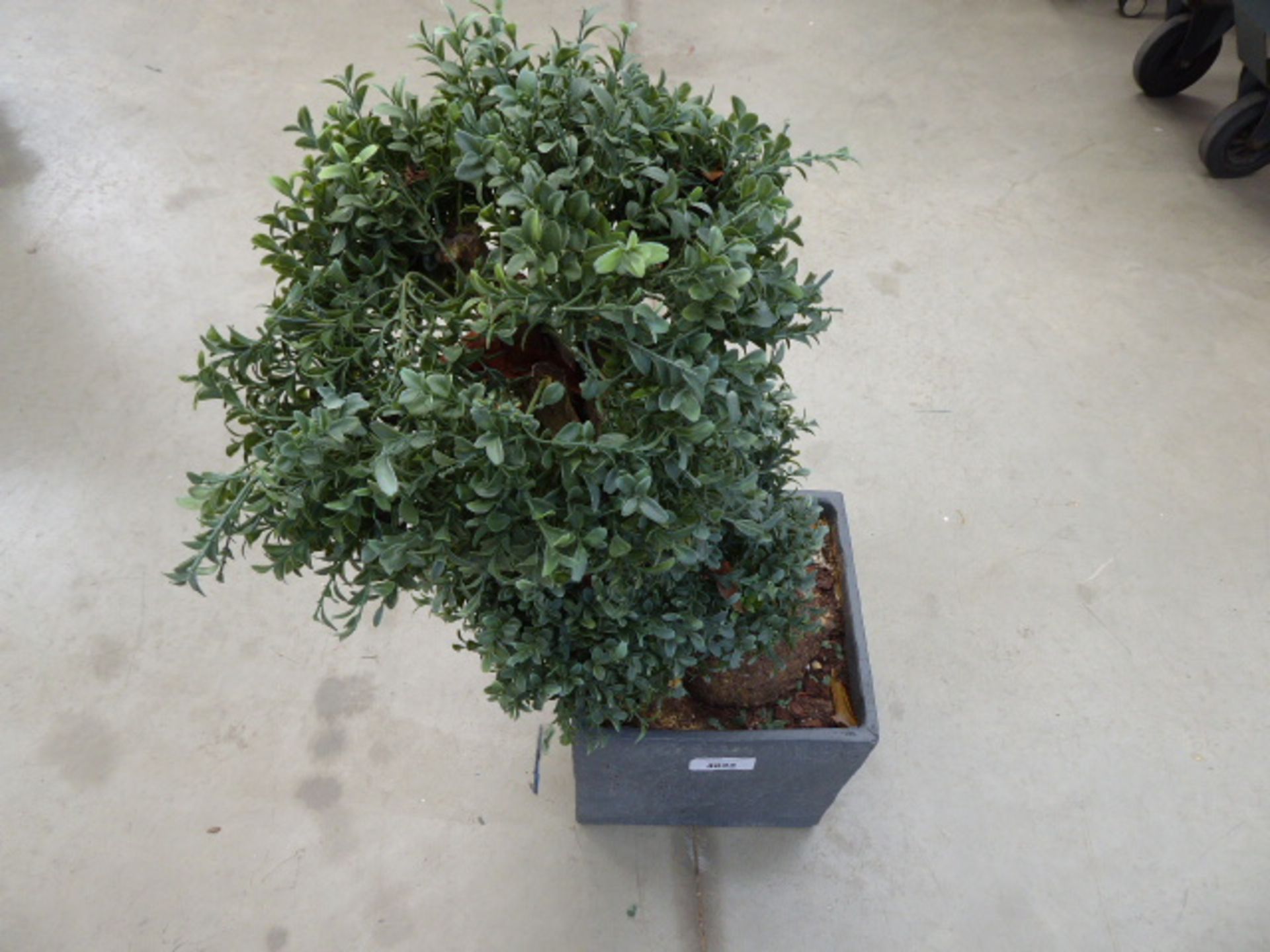 Small potted artificial plant