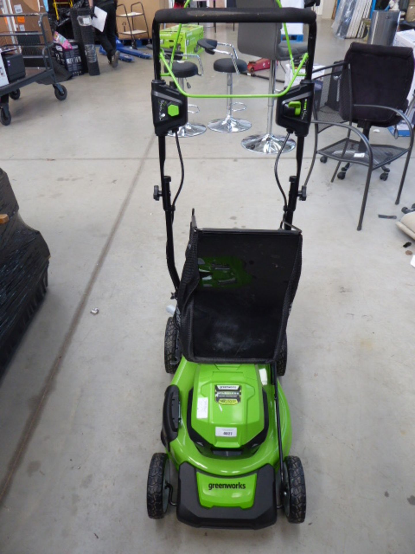 Greenworks battery powered lawn mower in green with grass box - Image 2 of 2