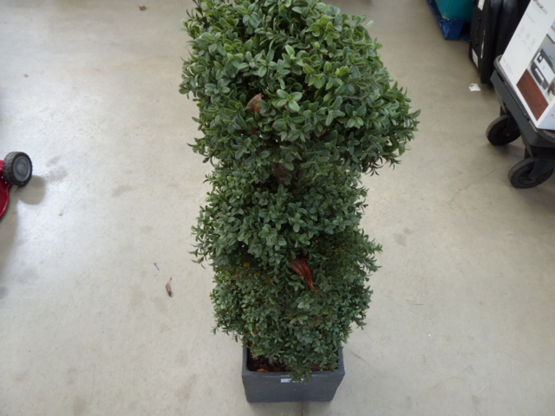 Large potted artificial plant