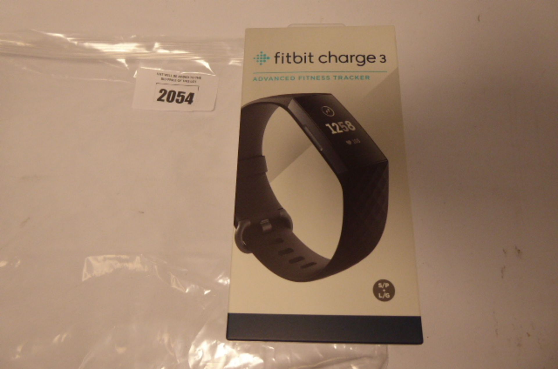 Fitbit charge 3 fitness tracker boxed.